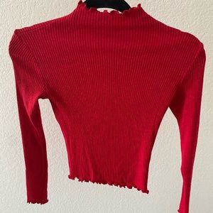 Cropped long sleeve sweater